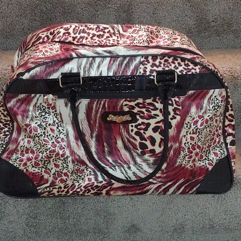 Kathy Van Zeeland roller suitcase